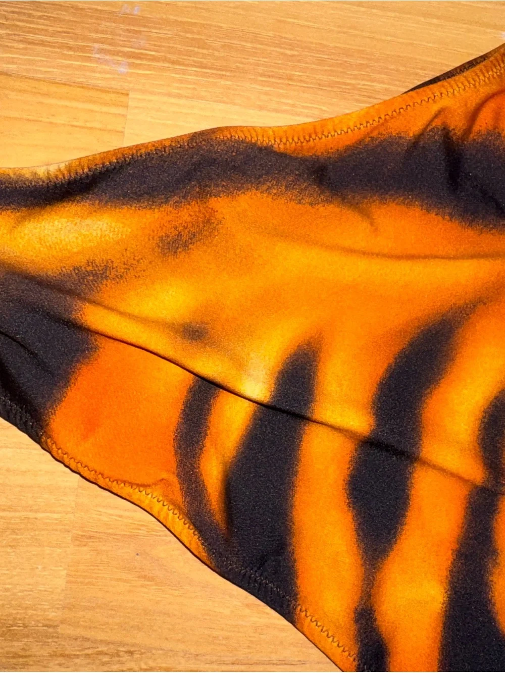 SKIMS Roberto Cavalier Dipped Tie Bottom in tiger face print size Large